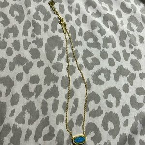 glittery blue kendra scott necklace